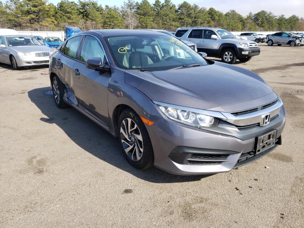Photo 1 from auction – 2018 HONDA CIVIC EX with VIN 2HGFC2F74JH579736
