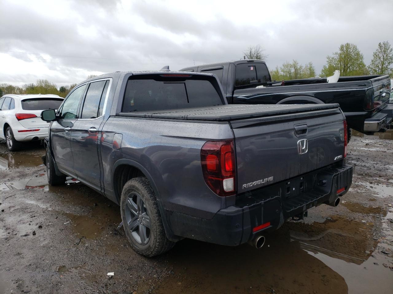Photo 3 from auction – 2021 HONDA RIDGELINE with VIN 5FPYK3F76MB023123