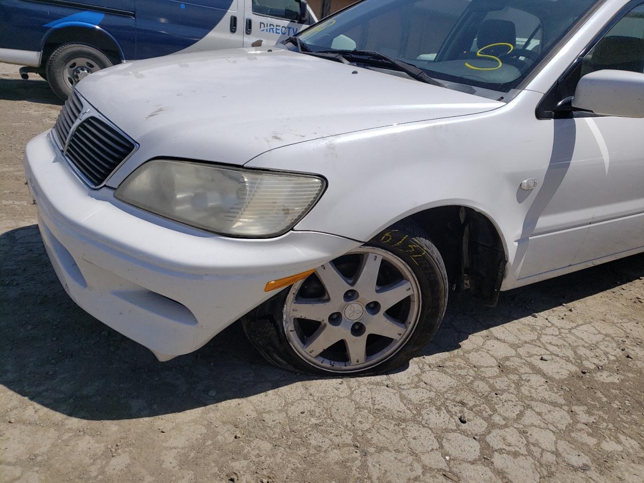 Photo 9 from auction – 2002 MITSUBISHI LANCER LS with VIN JA3AJ36E82U025941