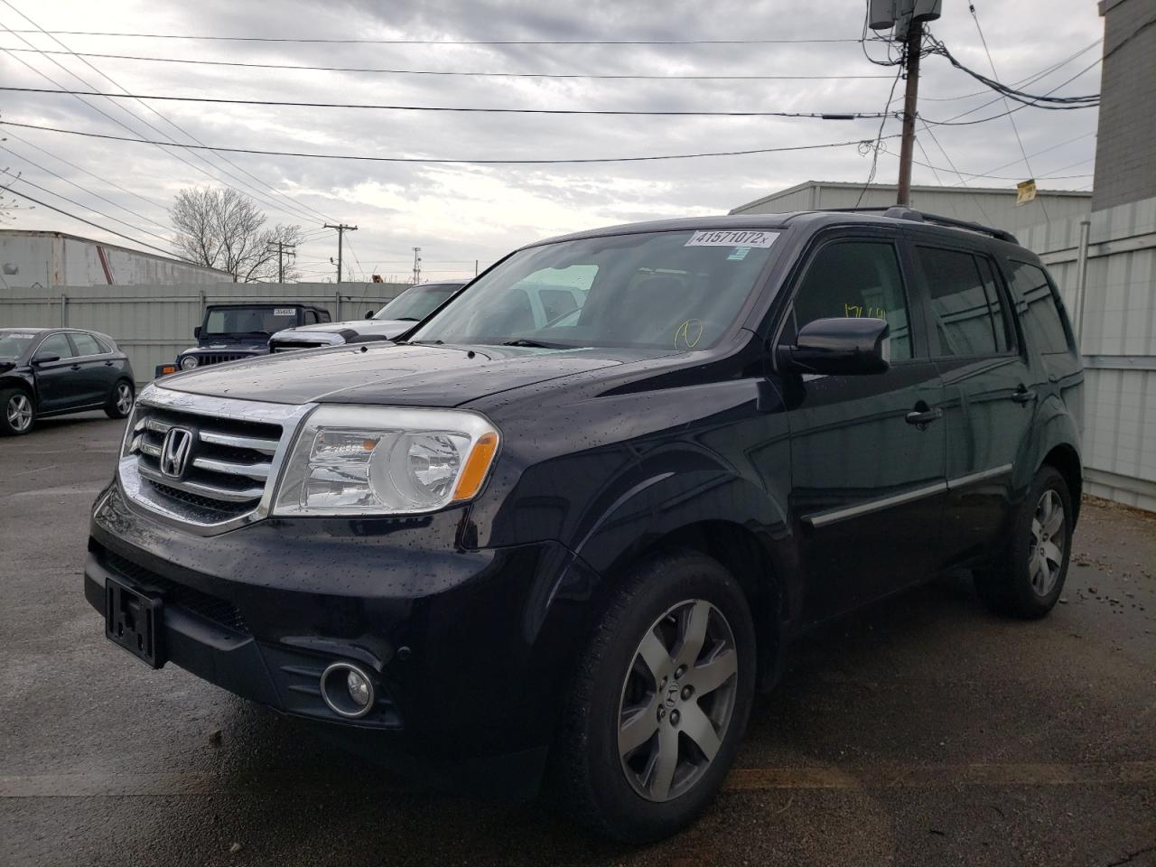 Photo 2 from auction – 2013 HONDA PILOT TOUR with VIN 5FNYF4H95DB070242