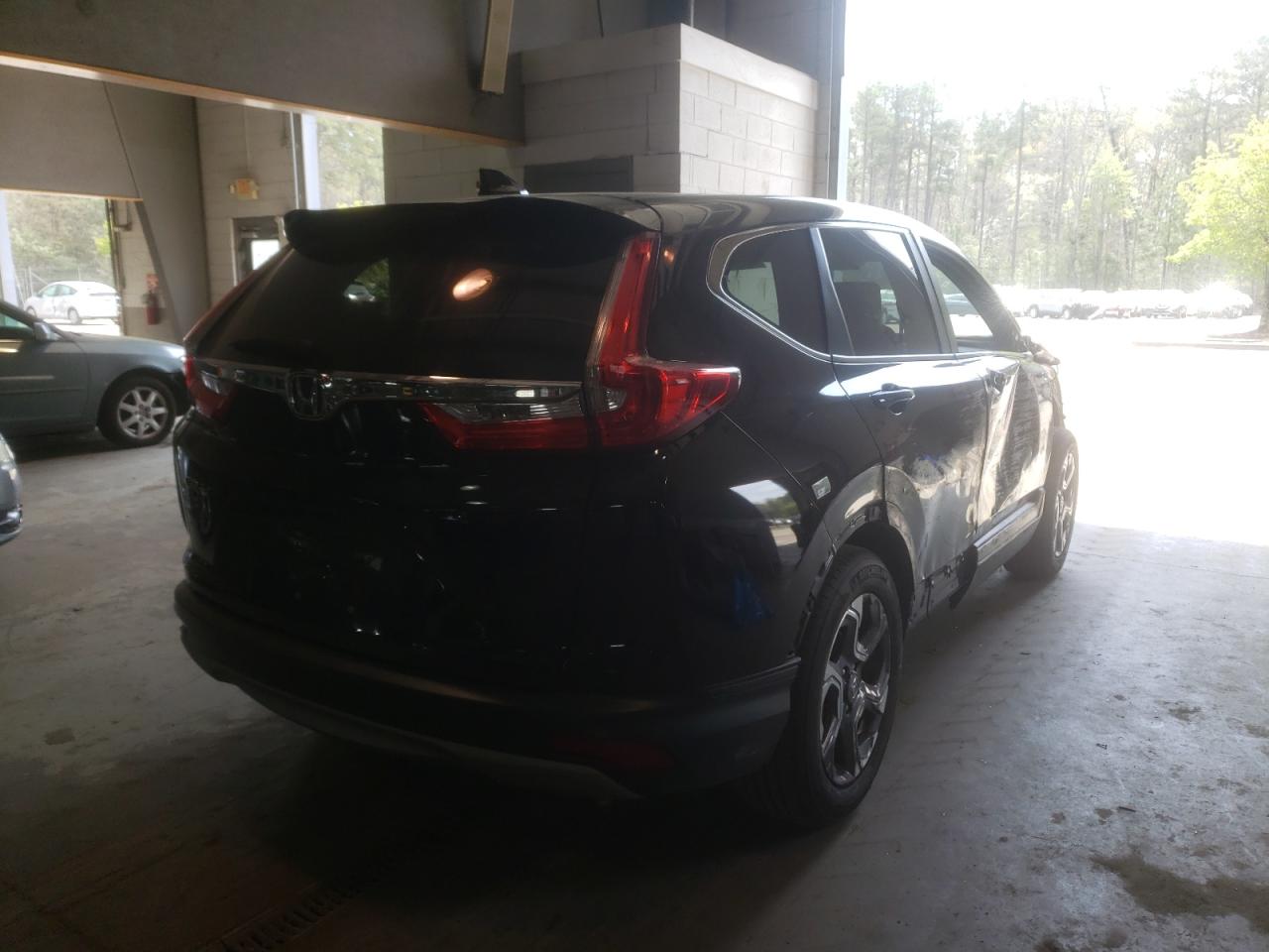 Photo 4 from auction – 2018 HONDA CR-V EX with VIN 7FARW1H50JE026990