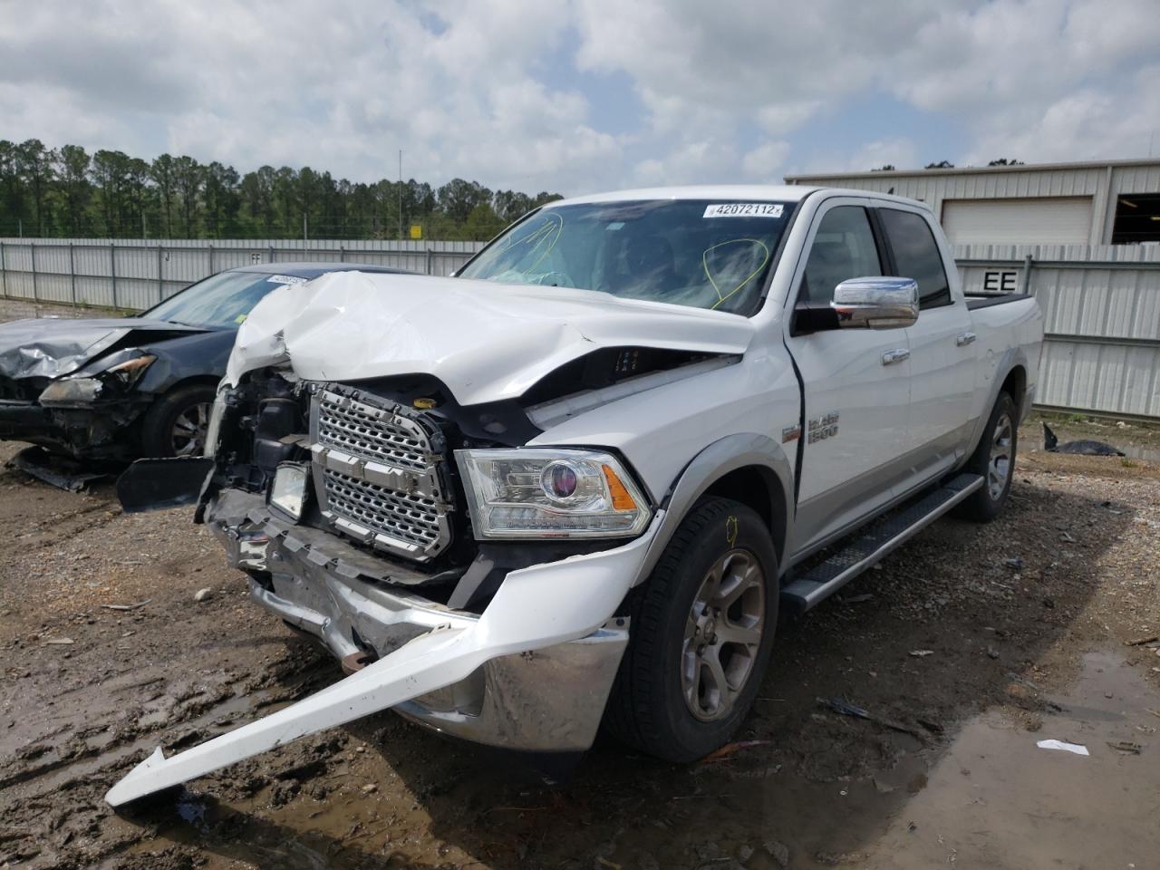 Photo 2 from auction – 2014 RAM 1500 LARAM with VIN 1C6RR7NT0ES177241