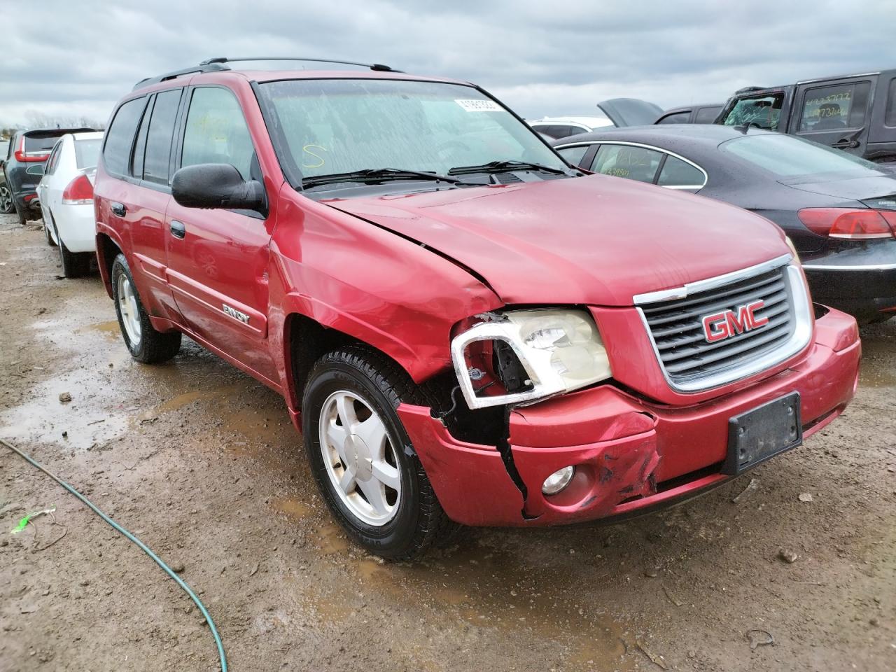 GMC ENVOY 2002 with VIN 1GKDS13S322362172 - Photo from auction