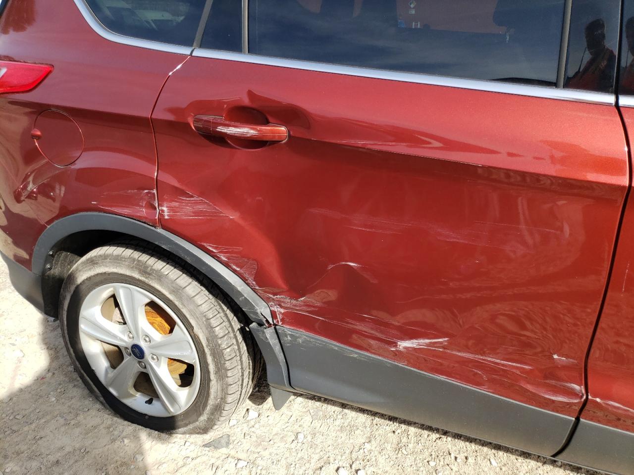 Photo 9 from auction – 2016 FORD ESCAPE SE with VIN 1FMCU9GXXGUA24880