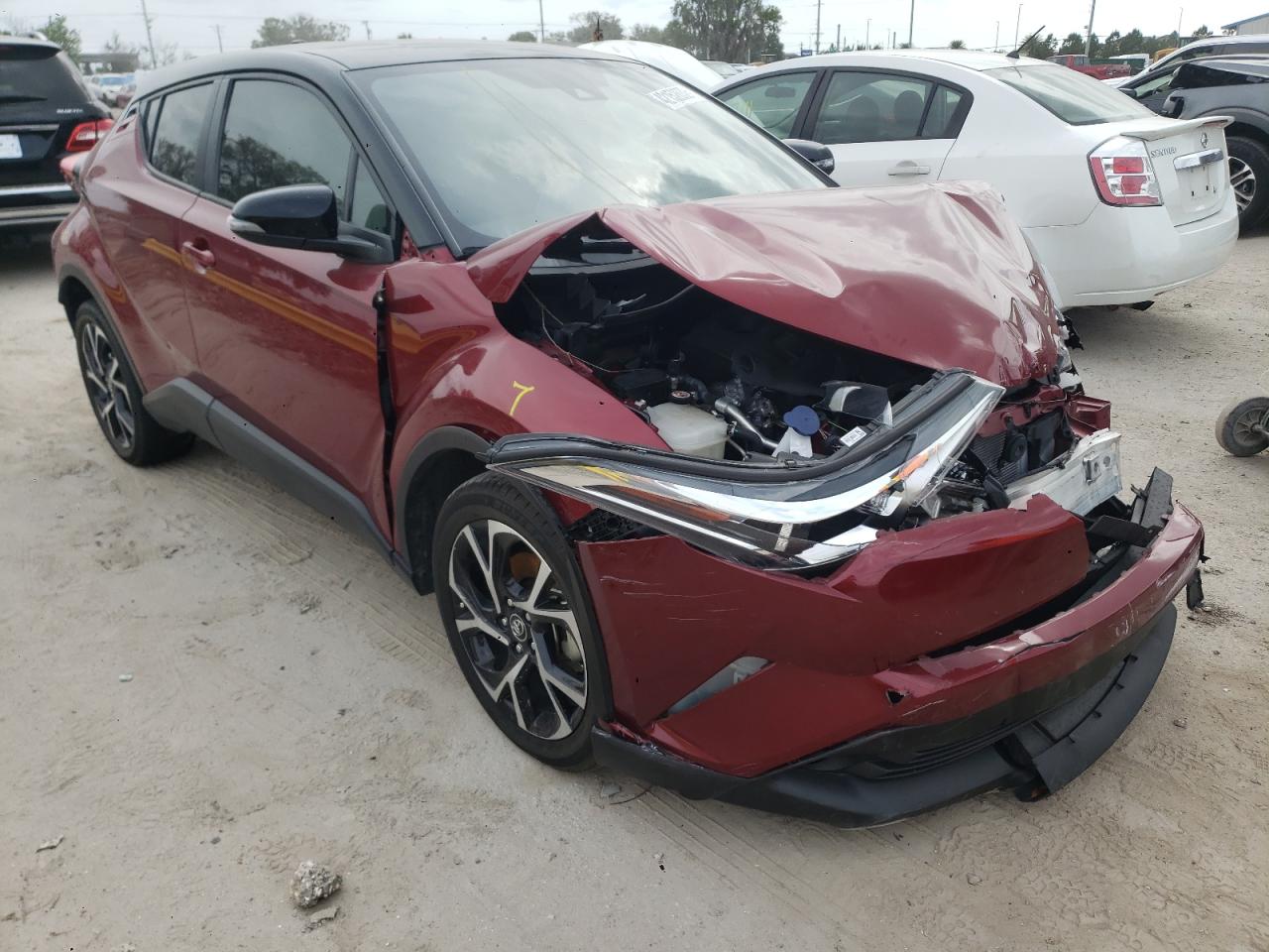 TOYOTA C-HR XLE 2019 with VIN NMTKHMBX0KR093314 - Photo from auction