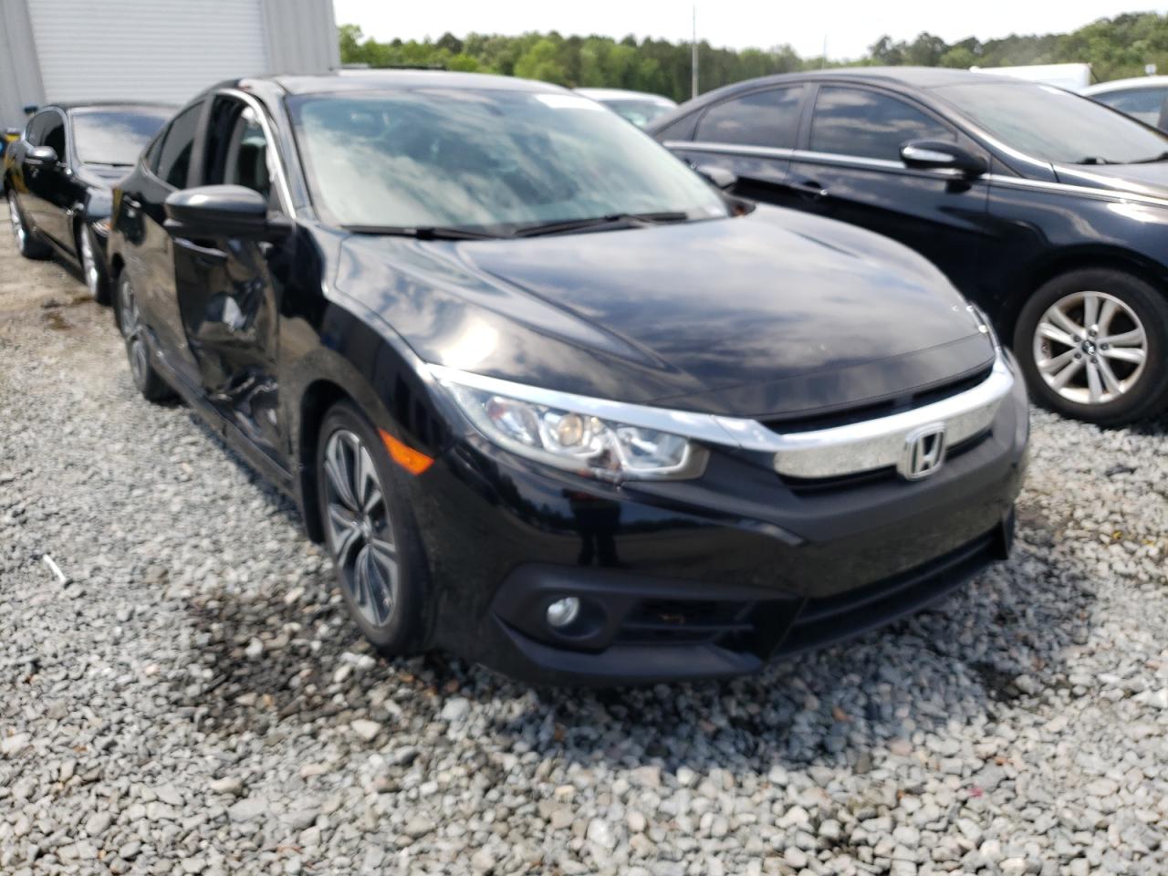 Photo 1 from auction – 2018 HONDA CIVIC EX with VIN JHMFC1F34JX029534