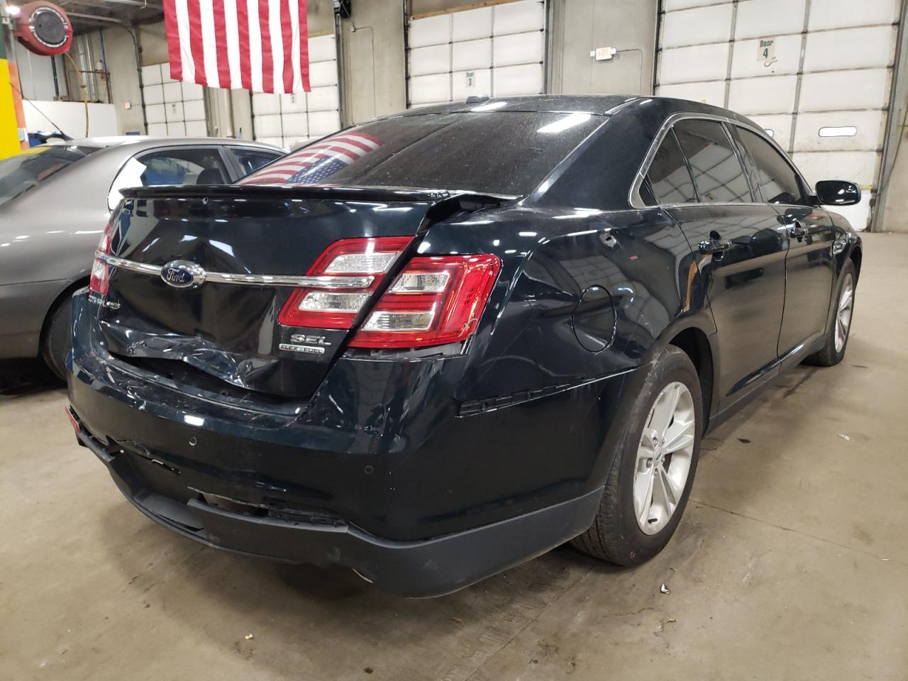 Photo 4 from auction – 2014 FORD TAURUS SEL with VIN 1FAHP2E81EG184569