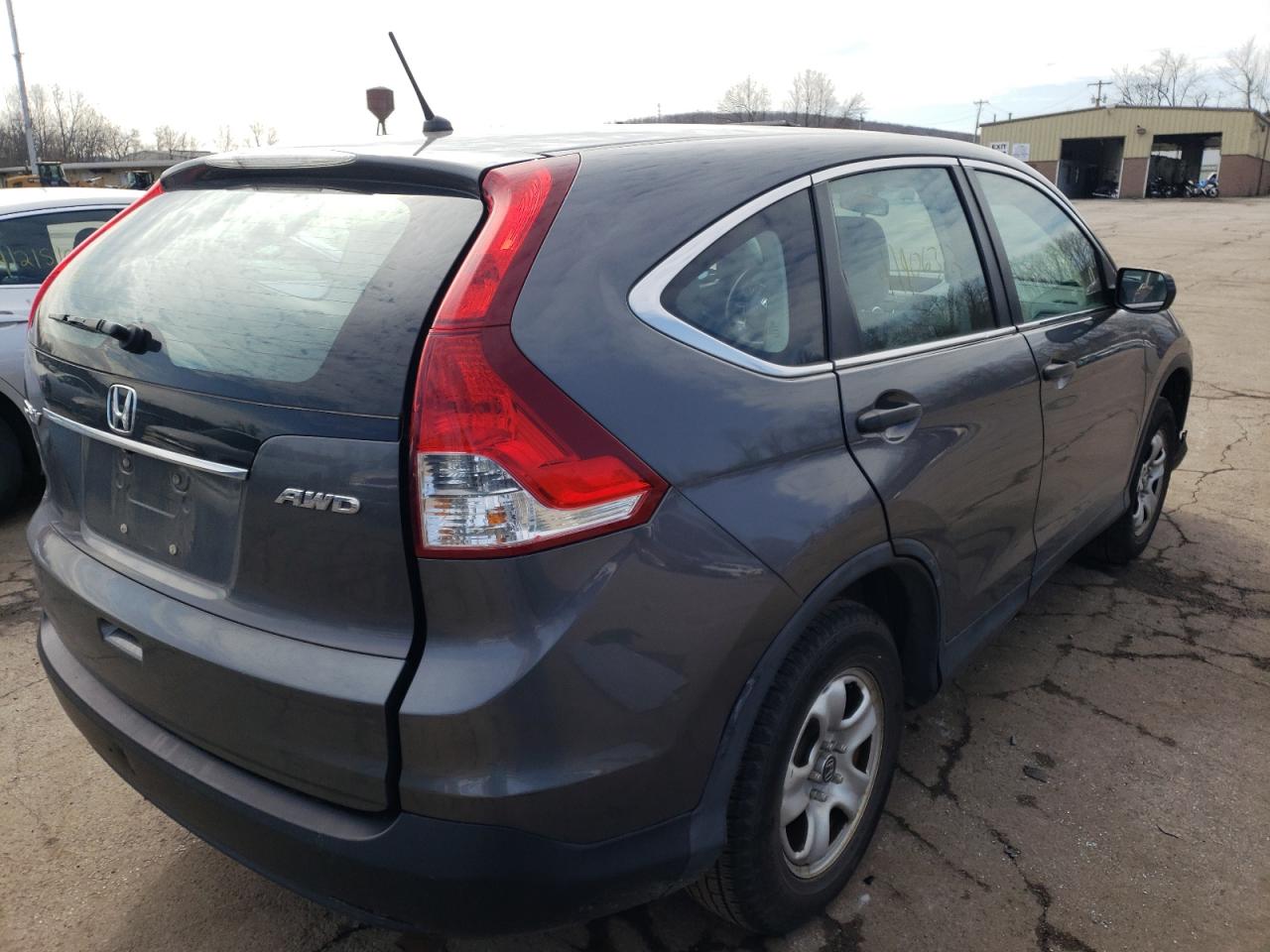 Photo 4 from auction – 2014 HONDA CR-V LX with VIN 2HKRM4H33EH702941