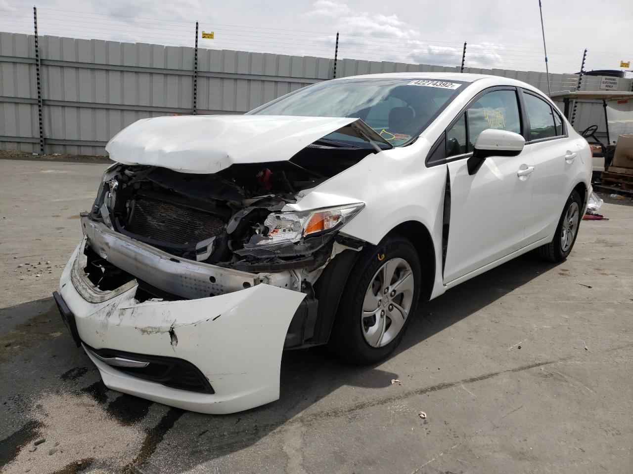 Photo 2 from auction – 2014 HONDA CIVIC LX with VIN 19XFB2F5XEE083664