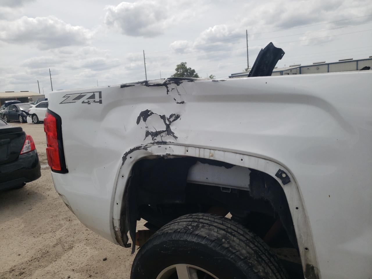 Photo 9 from auction – 2015 GMC SIERRA K25 with VIN 1GT120E80FF569983