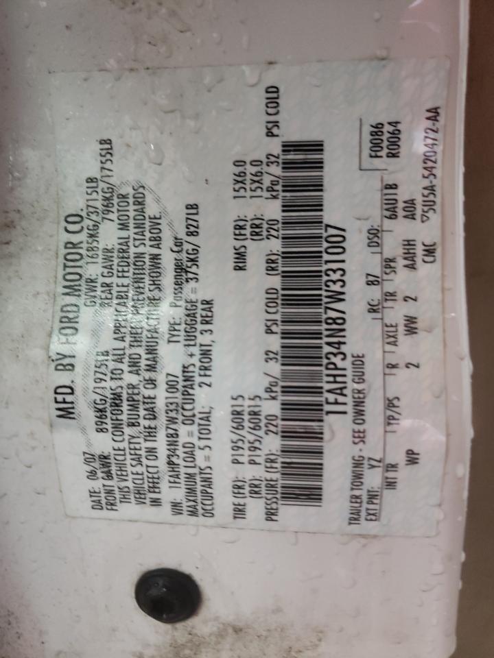 Photo 10 from auction – 2007 FORD FOCUS with VIN 1FAHP34N87W331007