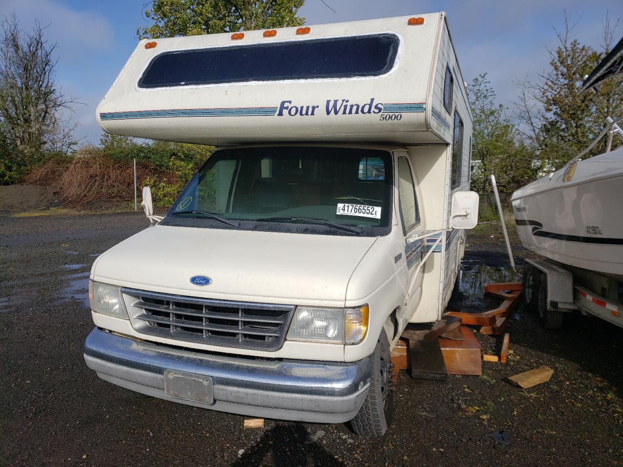 Photo 9 from auction – 1994 FORD FOURWINDS with VIN 1FDKE30G8PHB84023