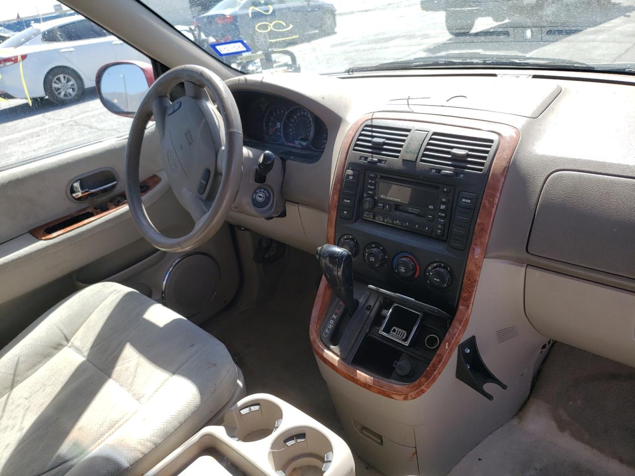 Photo 9 from auction – 2004 KIA SEDONA EX with VIN KNDUP131546579299