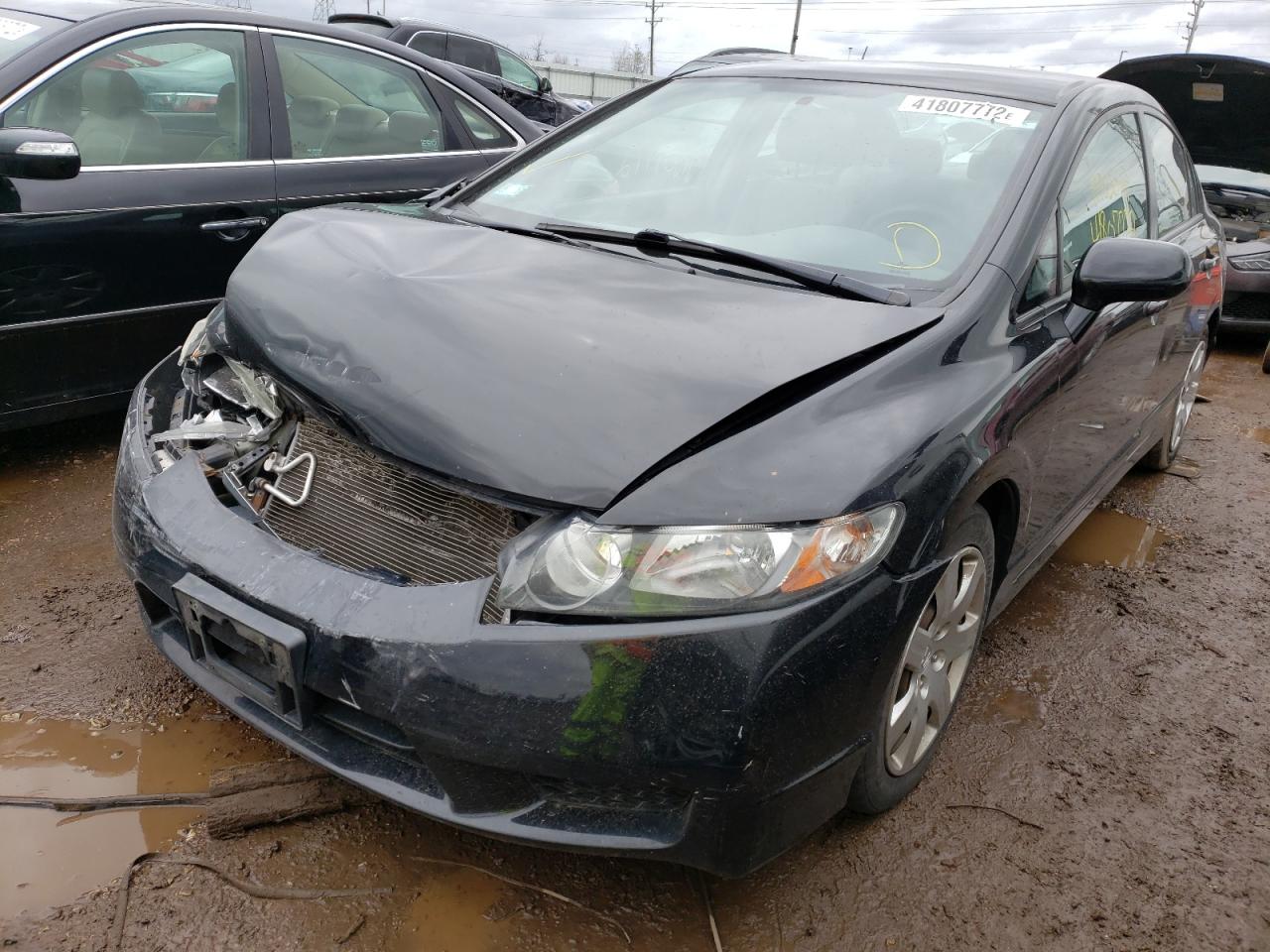 Photo 2 from auction – 2010 HONDA CIVIC LX with VIN 19XFA1F59AE053823