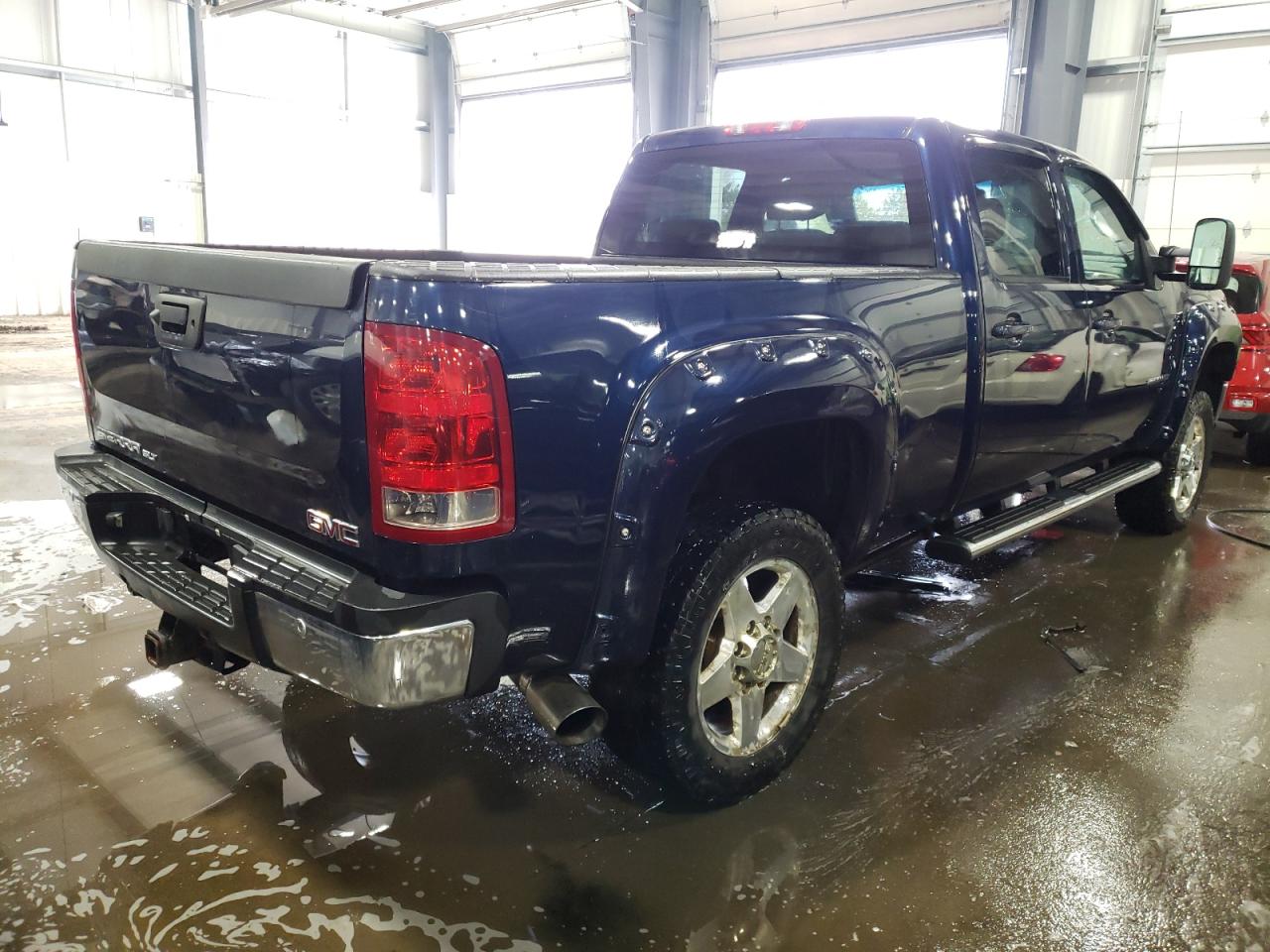 Photo 4 from auction – 2011 GMC SIERRA K25 with VIN 1GT121E81BF156986