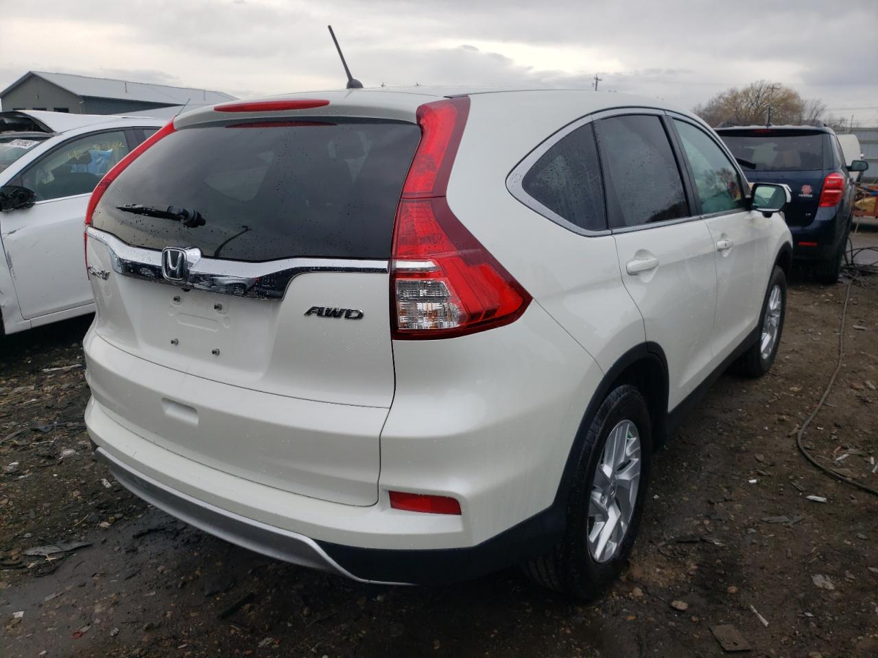 Photo 4 from auction – 2015 HONDA CR-V EX with VIN 5J6RM4H54FL035077