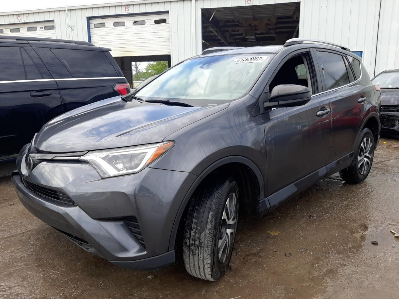 Photo 2 from auction – 2018 TOYOTA RAV4 LE with VIN JTMZFREV9JD130819