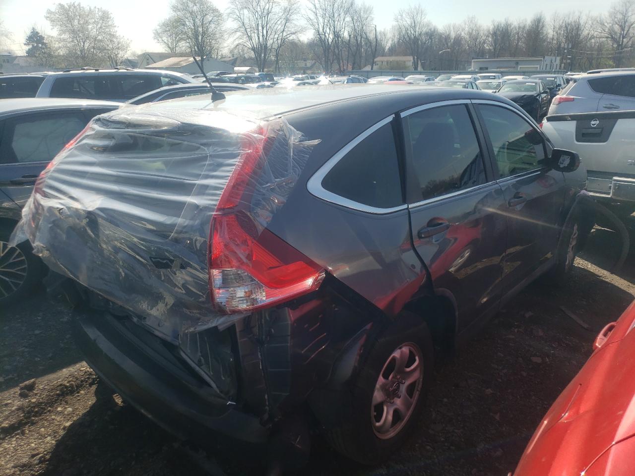 Photo 4 from auction – 2012 HONDA CR-V LX with VIN 5J6RM3H3XCL030762