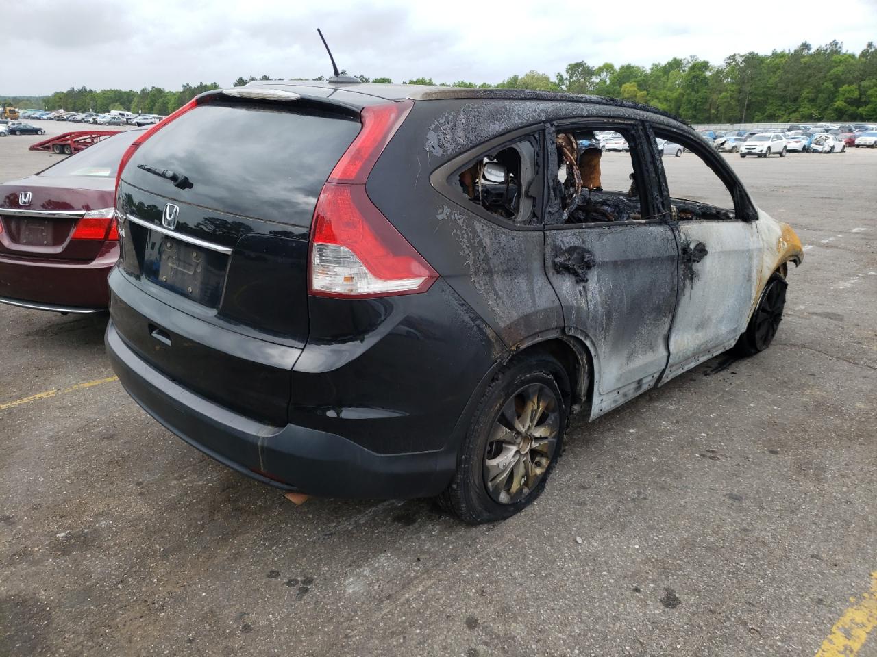 Photo 4 from auction – 2012 HONDA CR-V EXL with VIN 5J6RM3H75CL001933