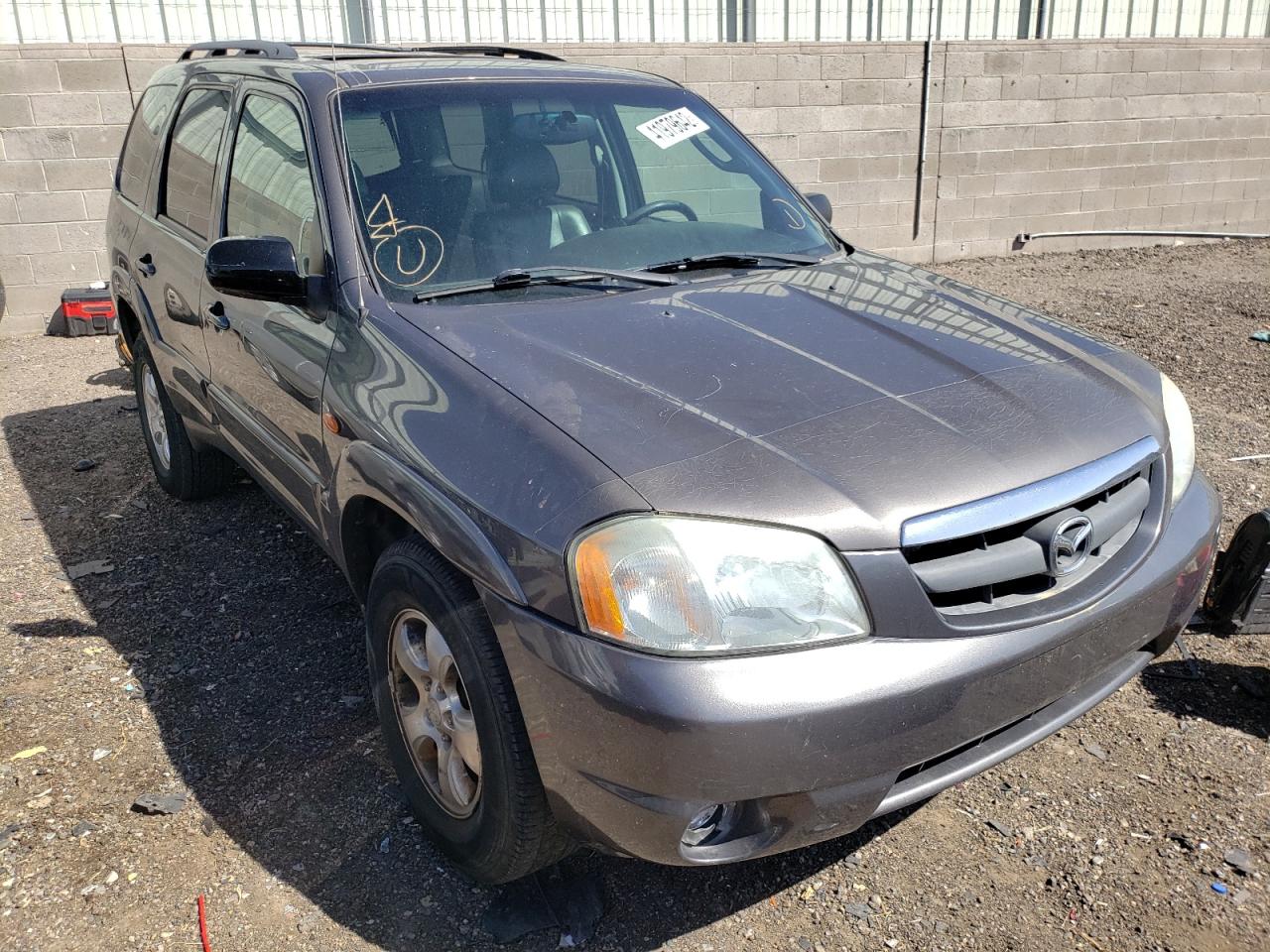 MAZDA TRIBUTE ES 2003 with VIN 4F2CZ96103KM33236 - Photo from auction