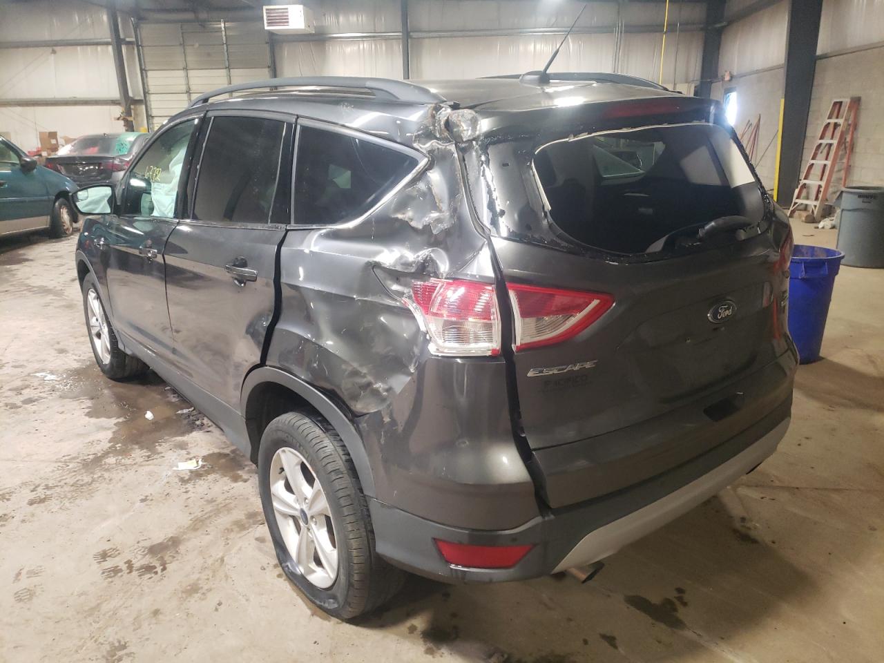 Photo 3 from auction – 2016 FORD ESCAPE SE with VIN 1FMCU9GX7GUC71306