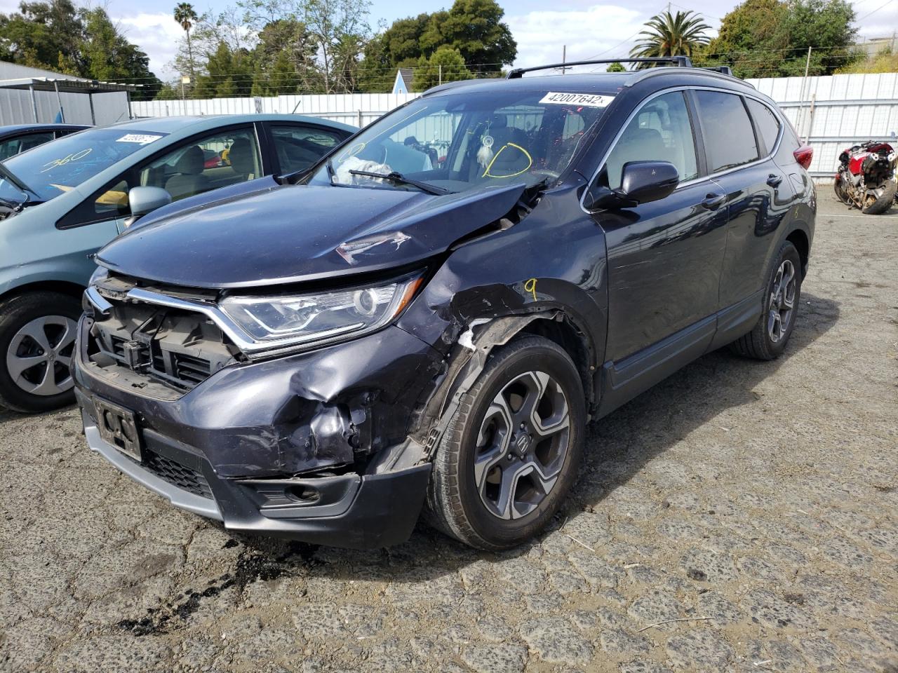 Photo 2 from auction – 2017 HONDA CR-V EX with VIN 7FARW1H53HE048590