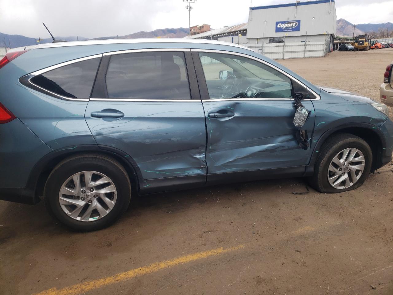 Photo 9 from auction – 2015 HONDA CR-V EXL with VIN 2HKRM4H79FH686555