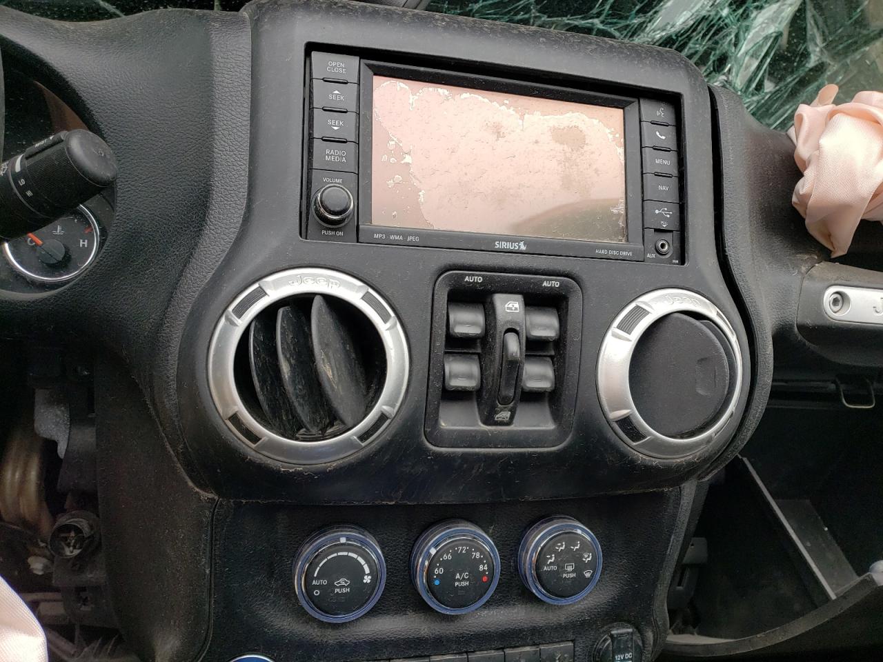 Photo 9 from auction – 2014 JEEP WRANGLER U with VIN 1C4HJWFG0EL160179