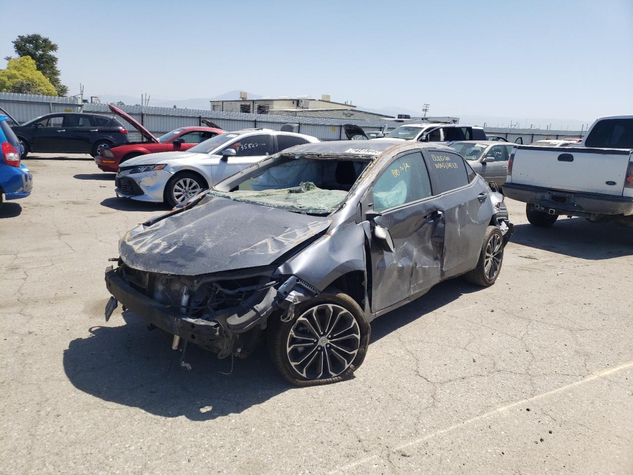 Photo 2 from auction – 2016 TOYOTA COROLLA L with VIN 5YFBURHE0GP557444