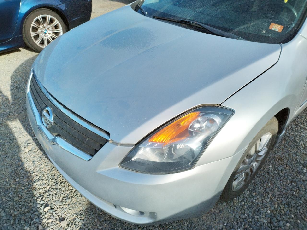 Photo 9 from auction – 2011 NISSAN ALTIMA HYB with VIN 1N4CL2AP1BC106248