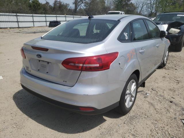 Photo 4 from auction – 2017 FORD FOCUS SE with VIN 1FADP3F21HL323206
