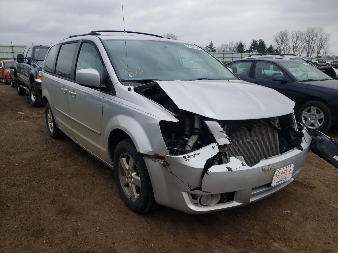 DODGE GRAND CARA 2010 with VIN 2D4RN5D16AR209729 - Photo from auction