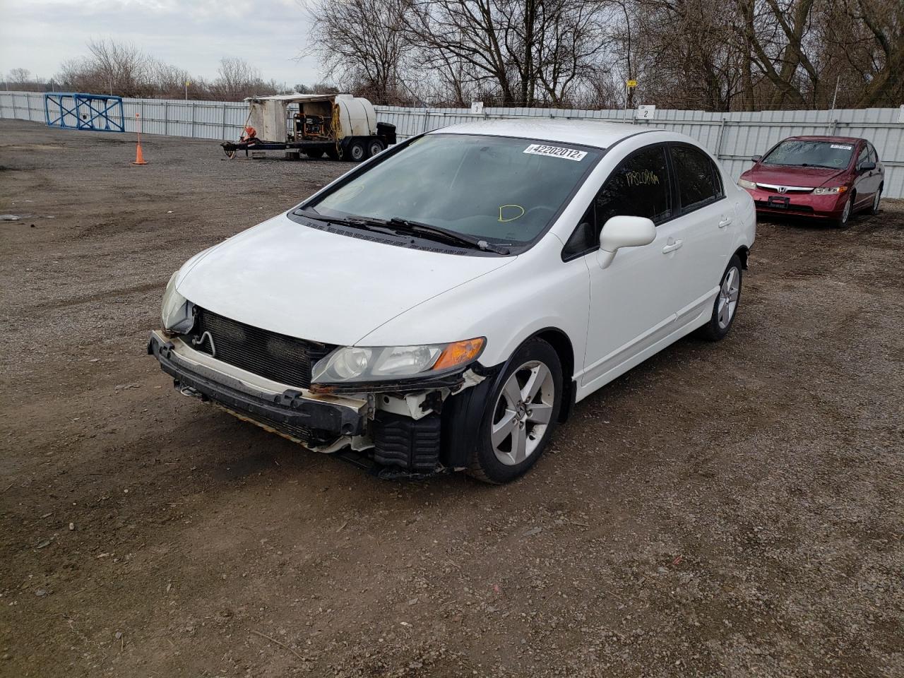Photo 2 from auction – 2007 HONDA CIVIC LX with VIN 2HGFA16507H101935