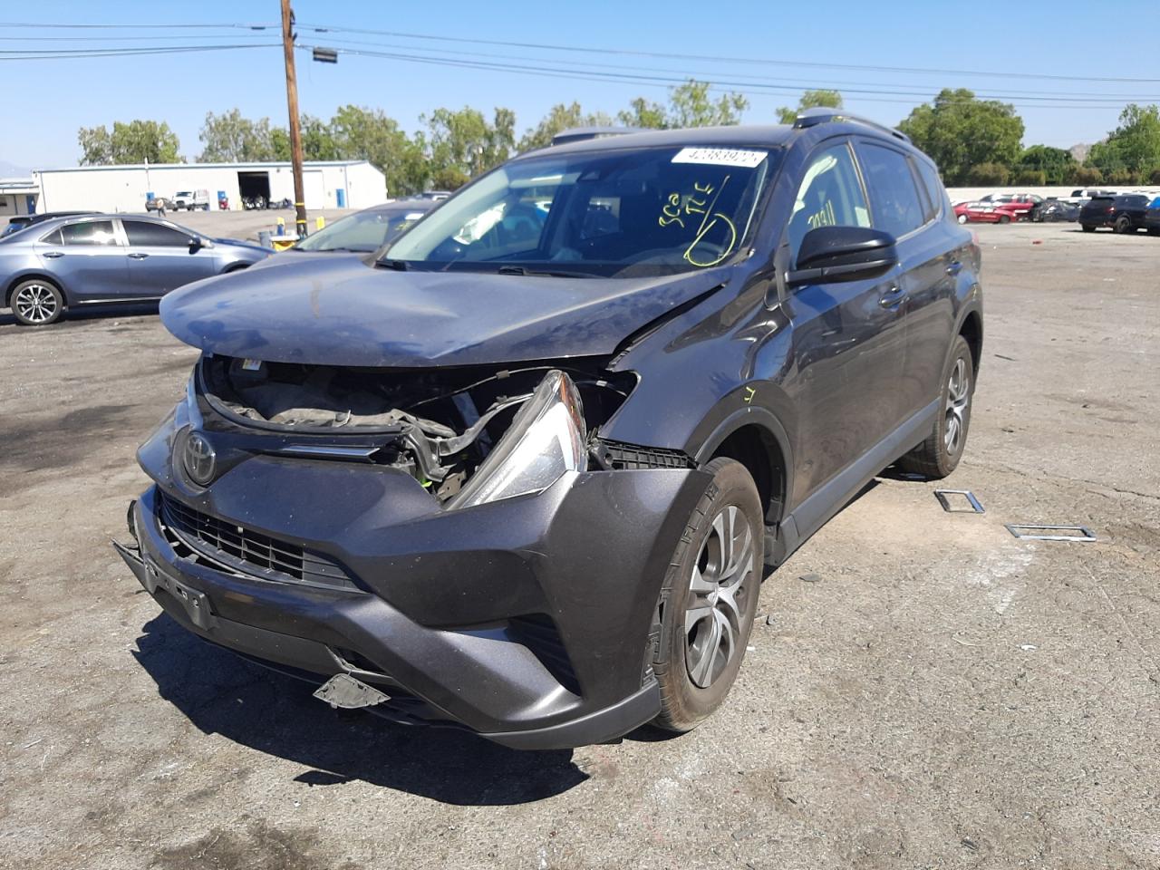 Photo 2 from auction – 2018 TOYOTA RAV4 LE with VIN JTMZFREV6JJ737519