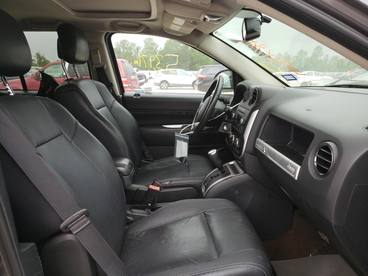 Photo 5 from auction – 2014 JEEP COMPASS LA with VIN 1C4NJCEA2ED857376