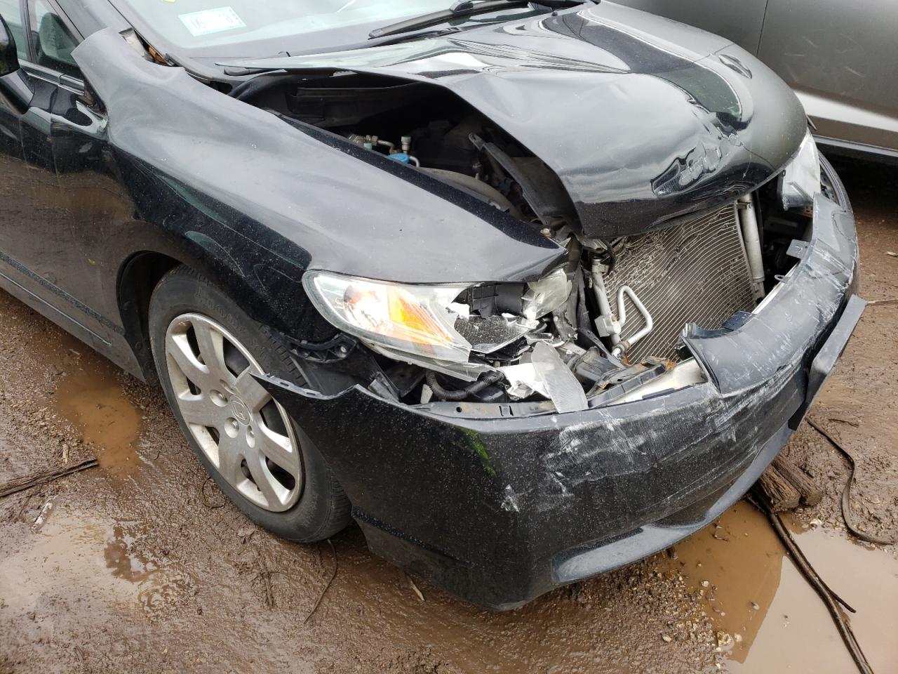 Photo 9 from auction – 2010 HONDA CIVIC LX with VIN 19XFA1F59AE053823