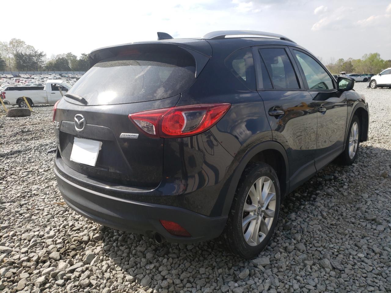 Photo 4 from auction – 2015 MAZDA CX-5 GT with VIN JM3KE4DY2F0526065