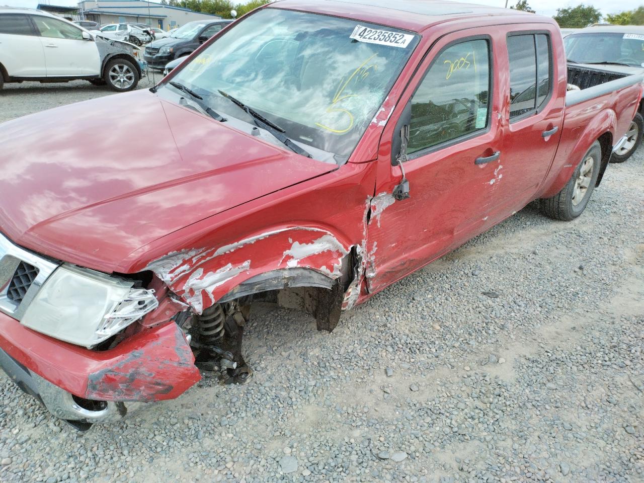 Photo 9 from auction – 2009 NISSAN FRONTIER C with VIN 1N6AD09W39C401177