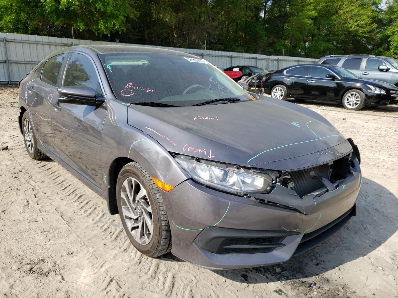 HONDA CIVIC EX 2017 with VIN 19XFC2F74HE059282 - Photo from auction