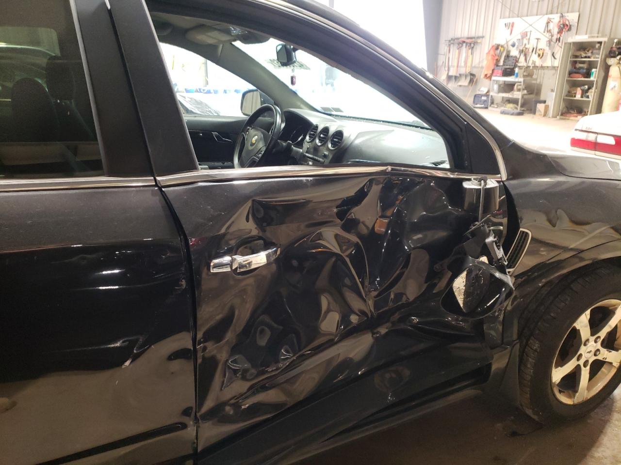 Photo 9 from auction – 2013 CHEVROLET CAPTIVA LT with VIN 3GNFL3EK8DS523477