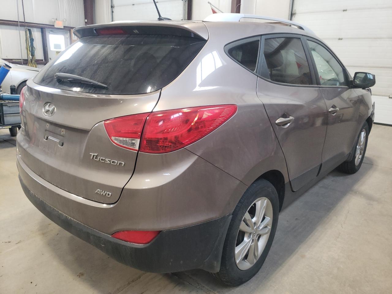 Photo 4 from auction – 2012 HYUNDAI TUCSON GLS with VIN KM8JUCAC1CU338146