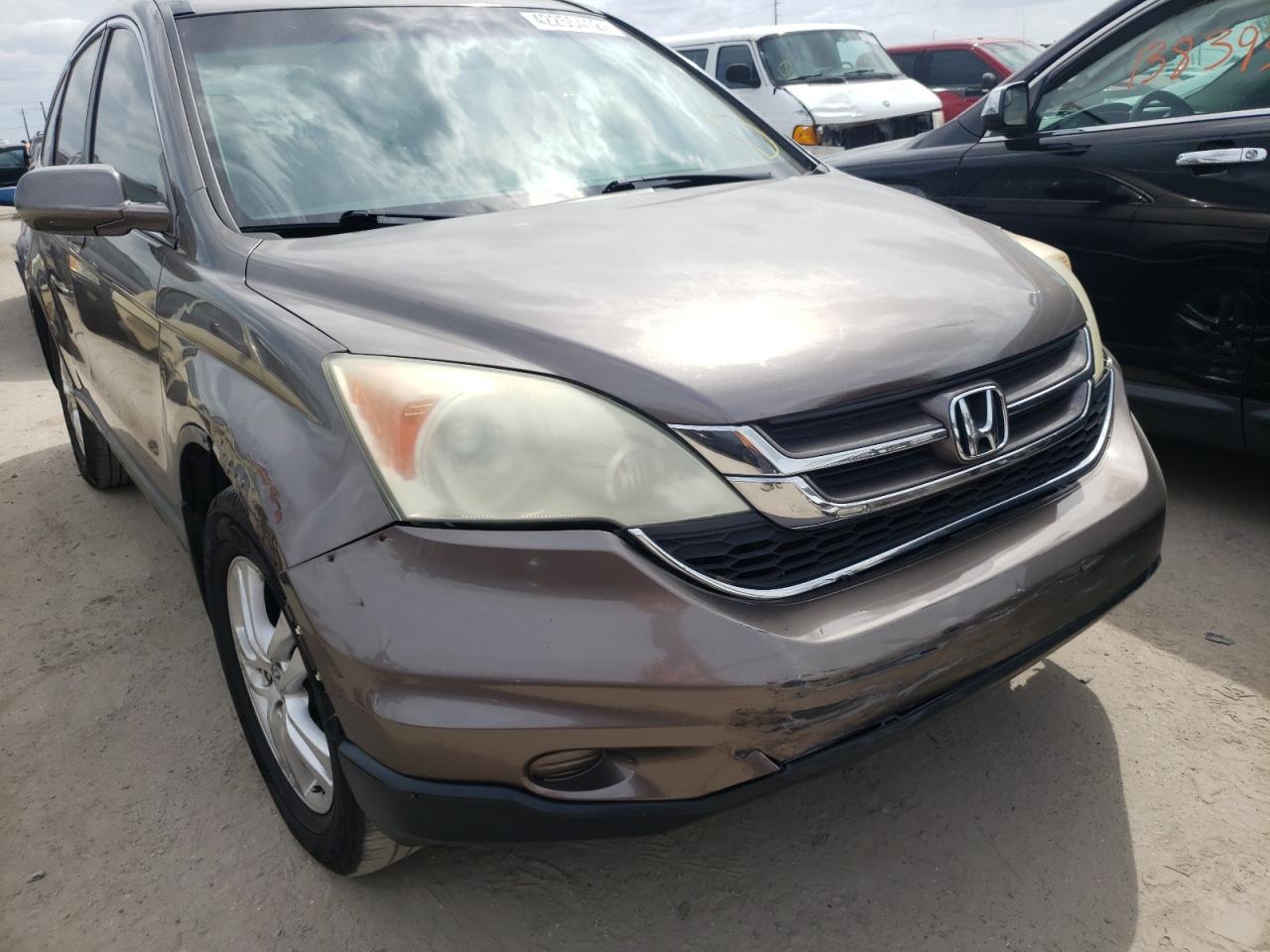 Photo 9 from auction – 2011 HONDA CR-V EXL with VIN 5J6RE4H79BL011205