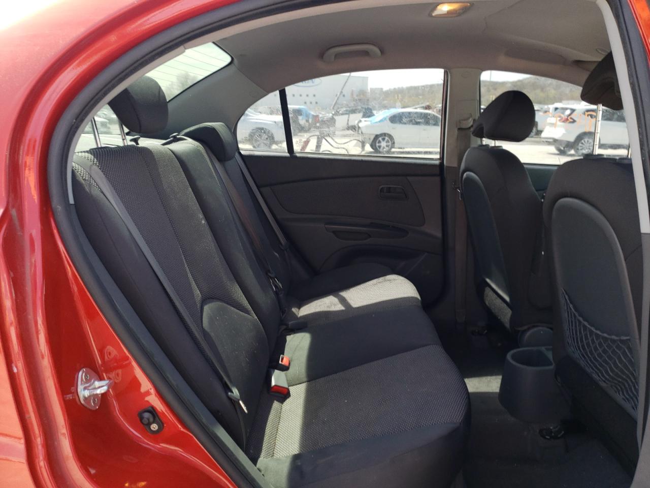 Photo 6 from auction – 2011 KIA RIO BASE with VIN KNADH4A37B6869444