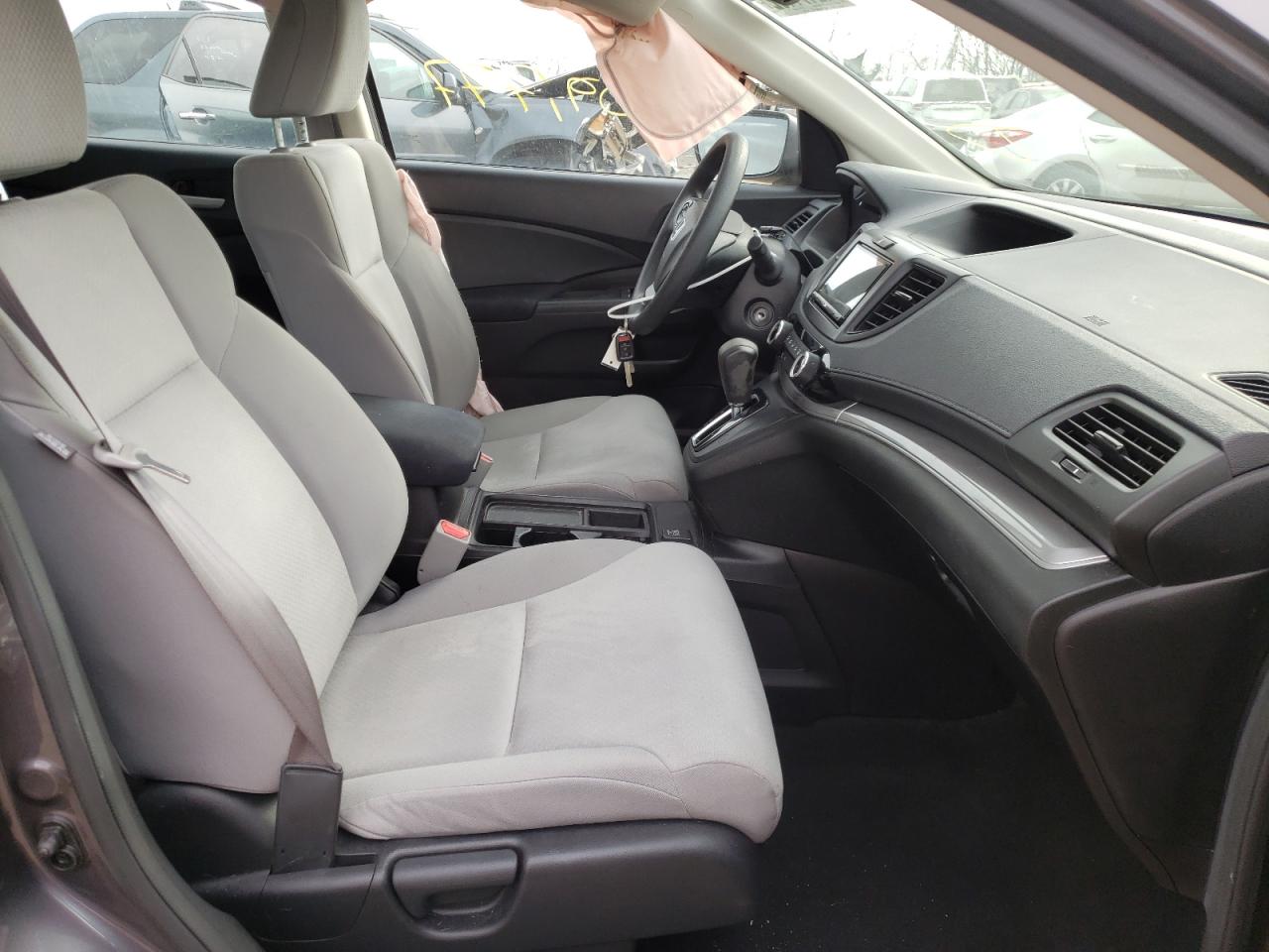 Photo 5 from auction – 2015 HONDA CR-V LX with VIN 5J6RM4H32FL037599