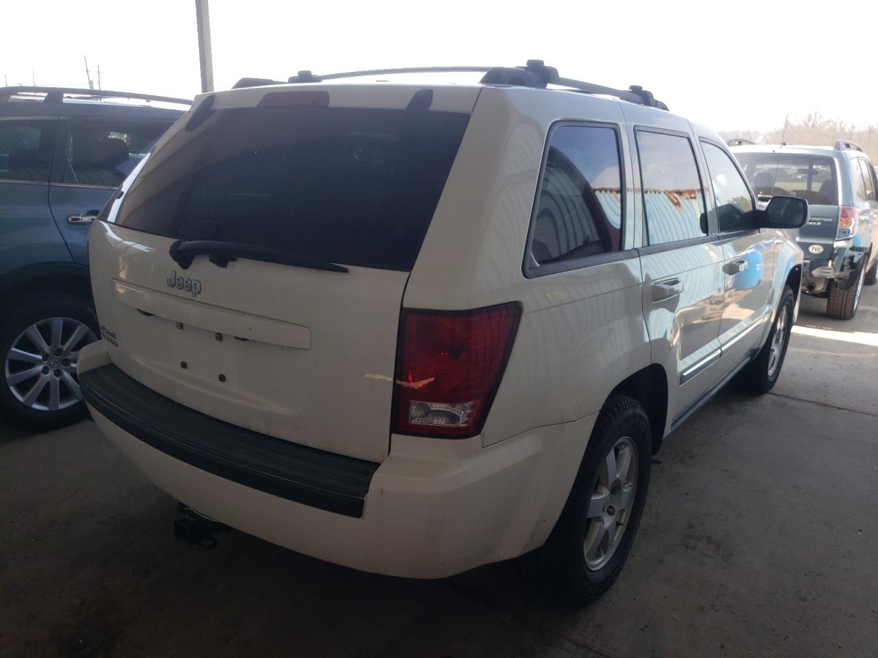 Photo 4 from auction – 2010 JEEP GRAND CHER with VIN 1J4PR4GK4AC137763