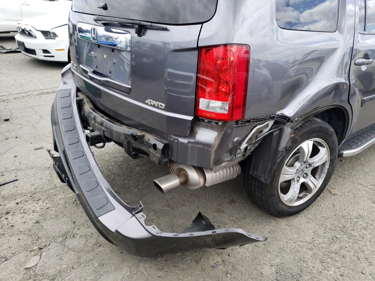 Photo 9 from auction – 2014 HONDA PILOT EX with VIN 5FNYF4H45EB025937