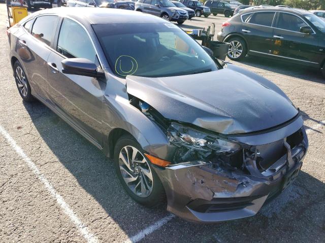 HONDA CIVIC EX 2018 with VIN 2HGFC2F76JH564705 - Photo from auction