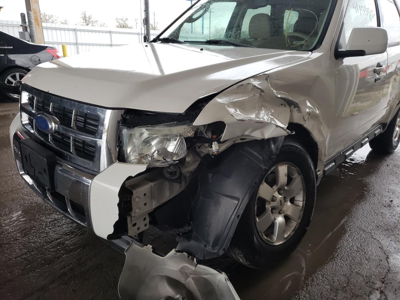 Photo 9 from auction – 2011 FORD ESCAPE LIM with VIN 1FMCU9EG8BKC13454