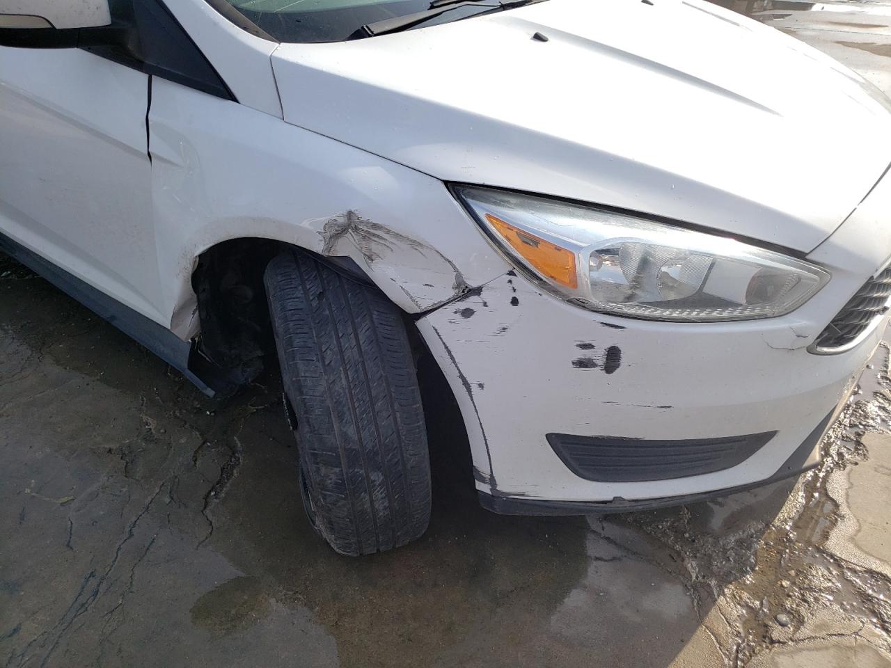 Photo 9 from auction – 2017 FORD FOCUS SE with VIN 1FADP3F28HL204553