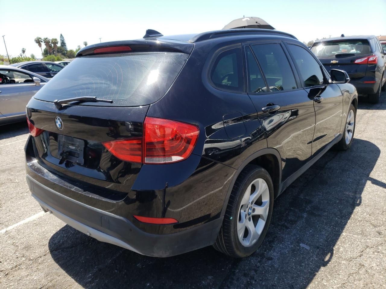 Photo 4 from auction – 2014 BMW X1 SDRIVE2 with VIN WBAVM1C54EVW56474
